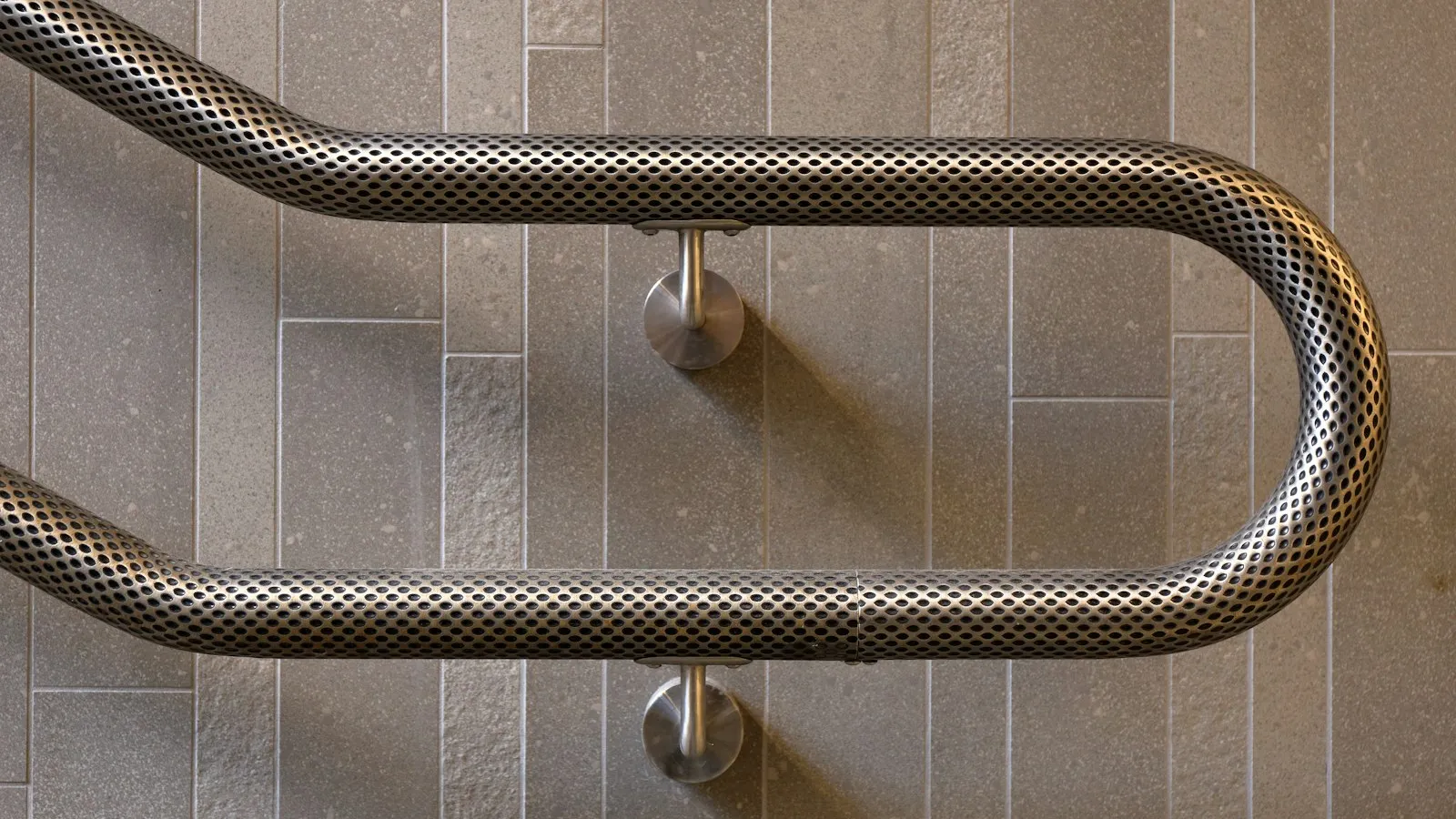 Curved stainless steel pipework detail