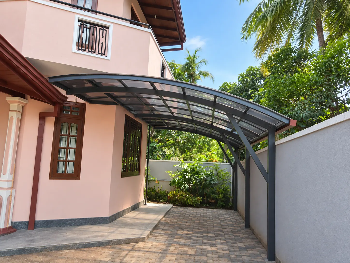 Curved carport, driveway with paver finish