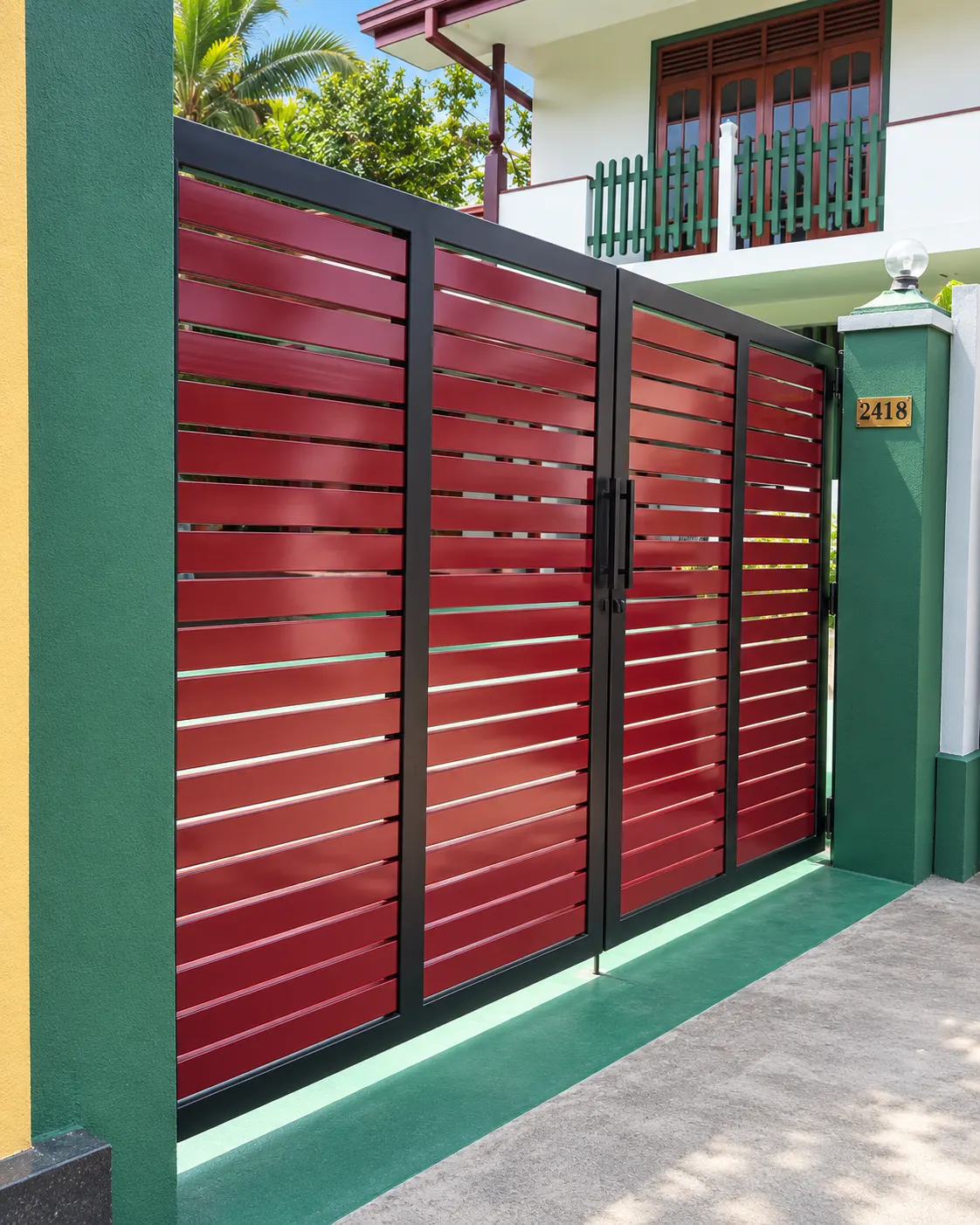 Modern black metal gate at a home entrance